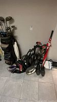 Overall lot with bag, cart, shoes, umbrella, towel