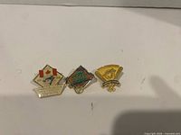 Front view of the three Toronto Blue Jays 1992 championship pins