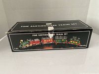 Box labeled "Fine Earthenware Train Set" front view