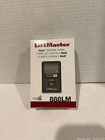 Front of boxed LiftMaster 888LM control panel