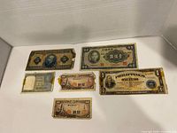 All six banknotes laid out for overview