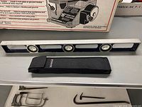 Beam level, pouch on shelf