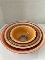 Nested view of all four bowls to show sizes and colors