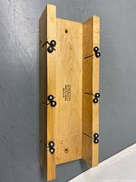 Top view of full wooden miter box showing Stanley branding and guide rollers