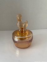 Dish assembled showing poodle lid and iridescent finish