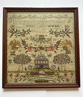 Full view of framed sampler showing overall design and frame