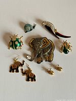 overview of brooches and earrings