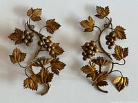 Pair of gold gilt grape vine wall sconces front view