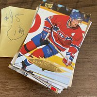 Stack of hockey cards, top card Vincent Damphousse Fleer Ultra
