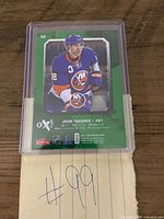 Back view of 2016-17 Fleer Showcase E-X2017 John Tavares card in plastic protector