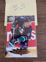 Front view of sleeved Paul Kariya 1995-96 Fleer Ultra hockey card