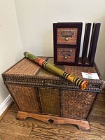 Overall view of trunk with organizer and painted stick on top