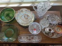 Top view of entire lot showing variety of glassware pieces