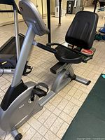 Full side view of Vision Fitness recumbent bike showing seat, pedals, frame