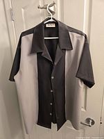 Front view of the two-tone Beta bowling shirt