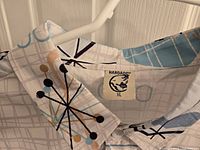 Close view of collar and Hardback tag showing size XL