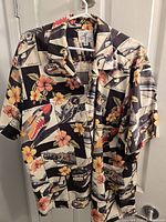 Front view of Palm Bay aviation floral Hawaiian shirt