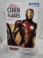 Front panel showing Iron Man graphic on Corn Flakes box