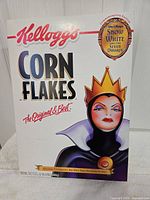 Front of Kellogg's Corn Flakes Snow White commemorative box showing Evil Queen artwork