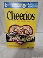 Front of 2011 Cheerios box with pull-back racer promotion