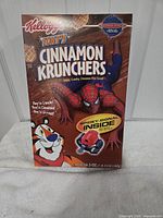 Front of Kellogg’s Tony’s Cinnamon Krunchers box showing Spider-Man graphic and Tony the Tiger