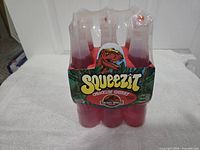 Front view showing Squeezit Jurassic Park branding
