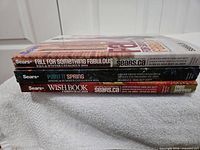 Spines of all three Sears catalogues showing titles and years