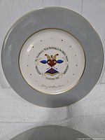 Front view of one plate showing design and border
