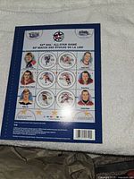 Front of 50th NHL All-Star Game stamp sheet presentation folder