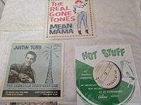 Front sleeves of all three records visible