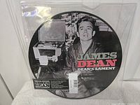 Front of James Dean Dean's Lament 10-inch picture disc in sealed sleeve