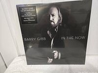 Front cover of Barry Gibb In the Now sealed LP with hype sticker.
