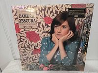 Front cover of Let’s Get Out of This Country showing sealed condition and hype sticker