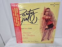 Front cover Party Girls LP showing title, artwork, shrink wrap