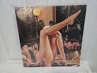 Front cover of Totally Mild Down Time LP in shrink with sticker