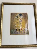 Gold-tone framed Klimt print with mat