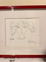 Front close-up of lithograph showing image, signature and edition