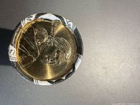 Top view of roll end showing uncirculated Sacagawea obverse