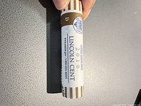 Paper-wrapped roll marked 2010 P Lincoln Cent with US Mint logo