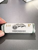 Wrapped roll with U.S. Mint logo, $10 and P mint mark