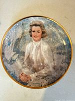 Front view of gold-rim Princess Grace decorative plate