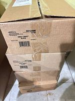 Stack of four sealed cartons labeled Hopkins 90124MI Shelf Links Black