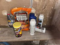 Full view showing all chemical containers and bag