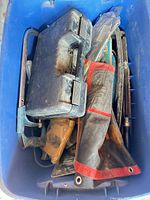 Blue tote with jigsaw, tool case, hand tools, clamps and consumables