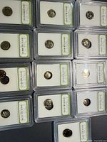 Array of INB-slabbed Roosevelt dimes displayed face up