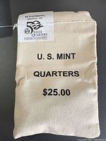 Front view of canvas coin bag with printed value and attached Wyoming label