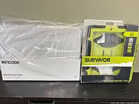 Both cases side by side on table