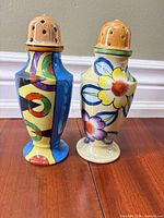 Both ceramic muffineers front view showing patterns