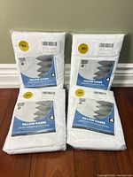 Front view of the four sealed pillowcase packs