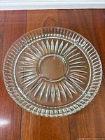 Top view displaying full platter, sunburst pattern and ribbed edge visible